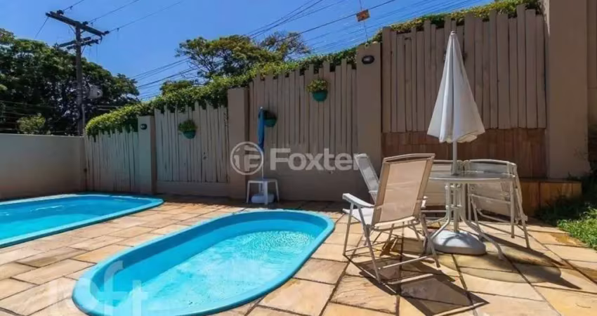 Casa em condomínio fechado com 3 quartos à venda na Rua Humberto de Campos, 601, Partenon, Porto Alegre