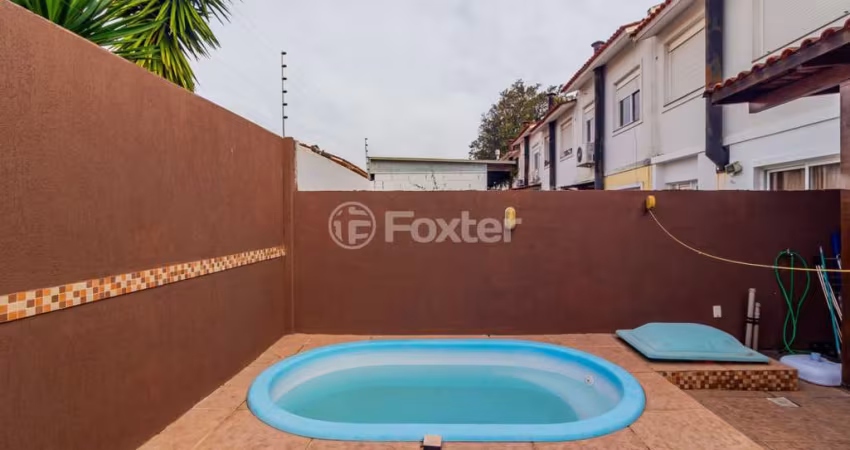 Casa em condomínio fechado com 2 quartos à venda na Avenida Edgar Pires de Castro, 2520, Hípica, Porto Alegre