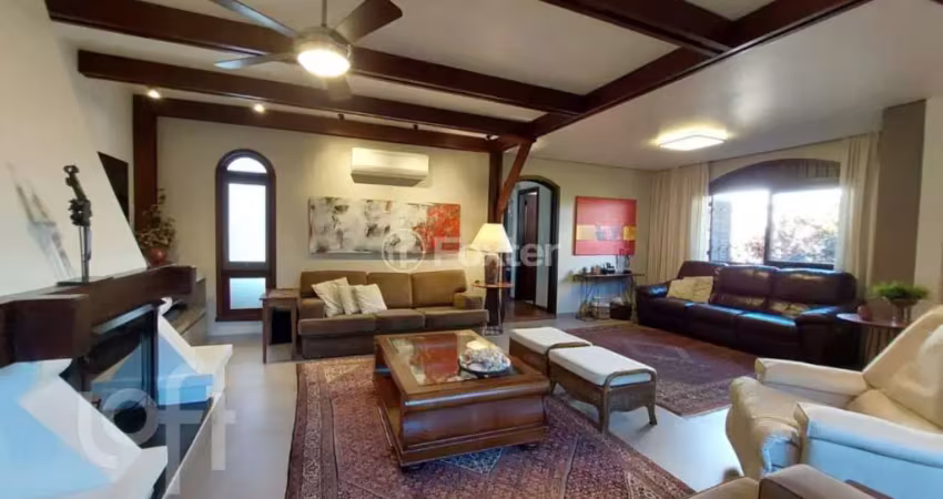 Casa com 3 quartos à venda na Rua Inhanduí, 252, Cristal, Porto Alegre