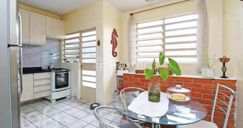 Casa com 3 quartos à venda na Rua Rafael Clark, 113, Partenon, Porto Alegre