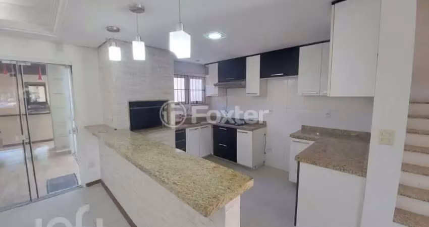 Casa com 4 quartos à venda na Rua Alexandre de Gusmão, 390, Hípica, Porto Alegre