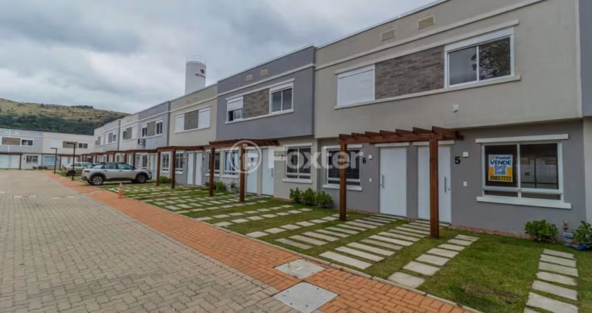 Casa em condomínio fechado com 2 quartos à venda na Estrada Cristiano Kraemer, 5018, Vila Nova, Porto Alegre