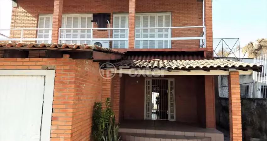 Casa com 3 quartos à venda na Rua Coronel Neves, 472, Medianeira, Porto Alegre