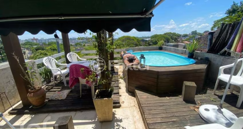 Casa com 3 quartos à venda na Rua Natércia Cunha Veloso, 267, Morro Santana, Porto Alegre