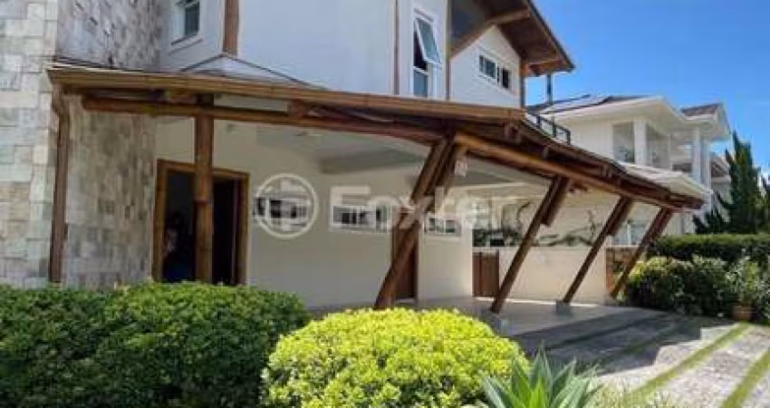 Casa em condomínio fechado com 4 quartos à venda na Rodovia Doutor Antônio Luiz Moura Gonzaga, 3801, Rio Tavares, Florianópolis