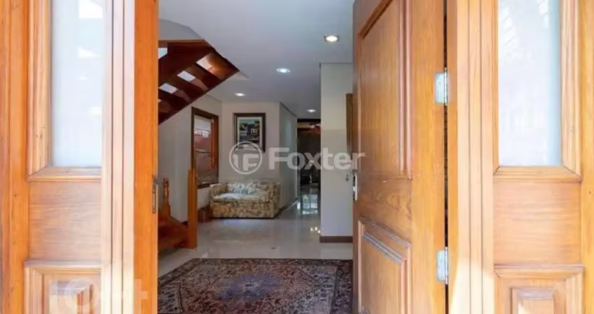 Casa em condomínio fechado com 3 quartos à venda na Avenida Juca Batista, 8000, Belém Novo, Porto Alegre