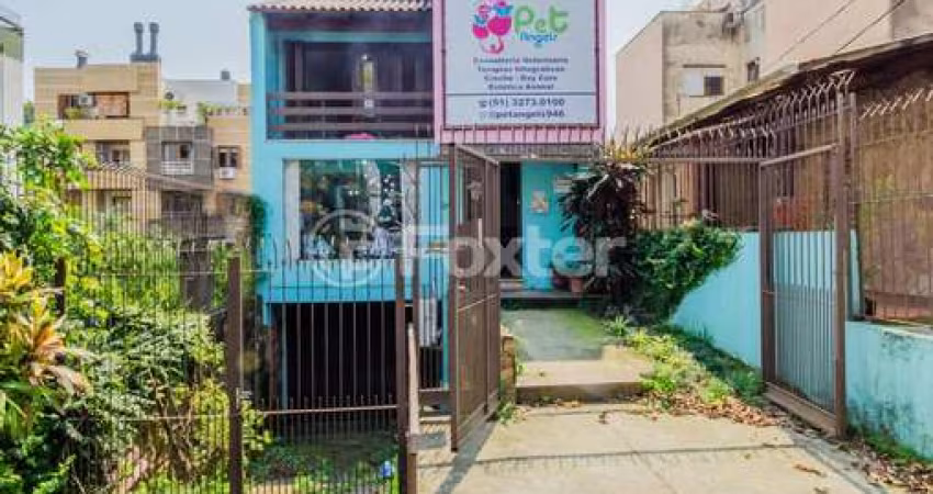 Casa com 4 quartos à venda na Rua Eudoro Berlink, 946, Auxiliadora, Porto Alegre