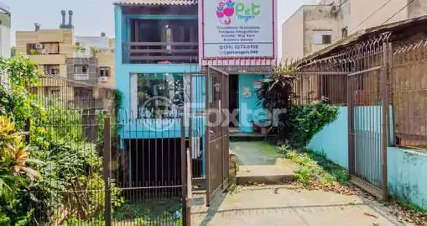 Casa com 4 quartos à venda na Rua Eudoro Berlink, 946, Auxiliadora, Porto Alegre