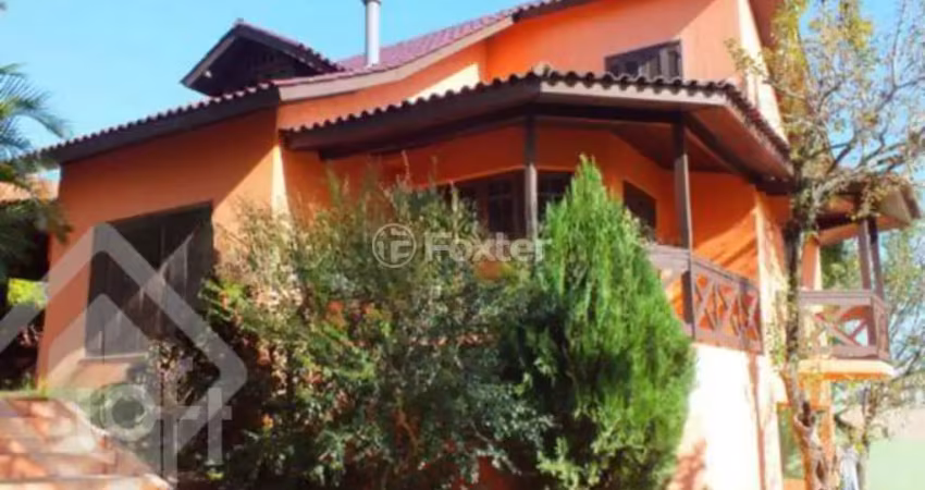 Casa em condomínio fechado com 3 quartos à venda na Avenida Vicente Monteggia, 1669, Cavalhada, Porto Alegre