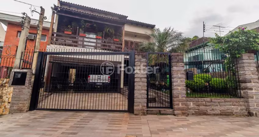 Casa com 4 quartos à venda na Rua Lindolfo Color, 95, Medianeira, Porto Alegre