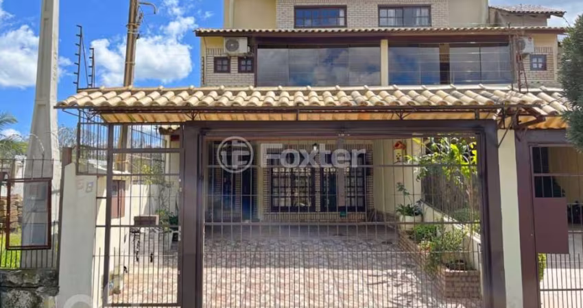 Casa com 4 quartos à venda na Rua Doutor Egydio Michaelsen, 58, Cavalhada, Porto Alegre