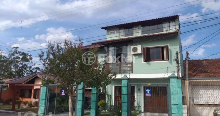 Casa com 5 quartos à venda na Rua Doutor Telmo Vergara, 554, Partenon, Porto Alegre