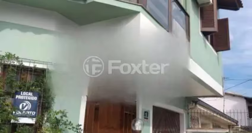 Casa com 5 quartos à venda na Rua Doutor Telmo Vergara, 554, Partenon, Porto Alegre