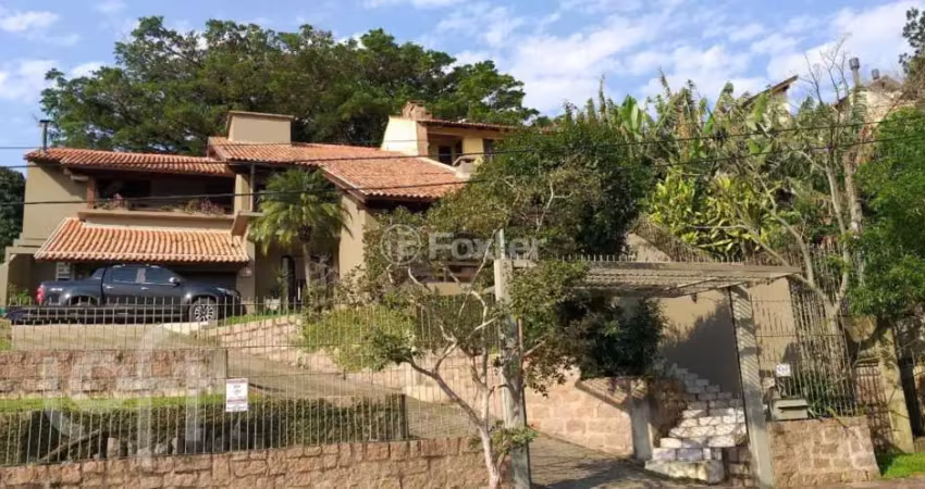 Casa com 3 quartos à venda na Rua Edgar Luiz Schneider, 510, Jardim Isabel, Porto Alegre