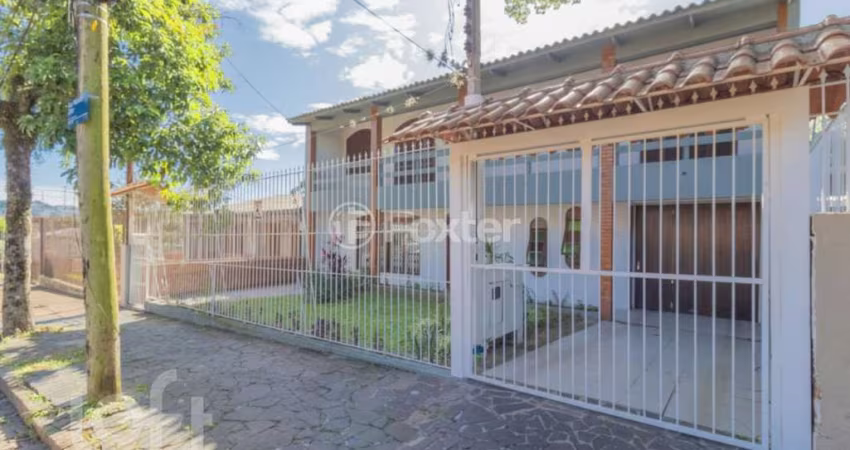 Casa com 4 quartos à venda na Rua Mathilde Zatar, 128, Nonoai, Porto Alegre