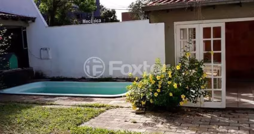 Casa em condomínio fechado com 3 quartos à venda na Avenida Juca Batista, 4115, Hípica, Porto Alegre