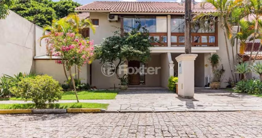 Casa em condomínio fechado com 3 quartos à venda na Avenida Eduardo Prado, 2050, Cavalhada, Porto Alegre