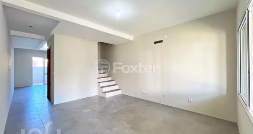 Casa com 3 quartos à venda na Rua Itacyr Rossi, 33, Guarujá, Porto Alegre