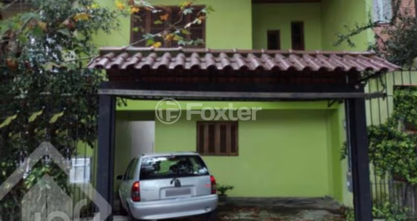 Casa com 3 quartos à venda na Rua Pedro Velho, 264, Partenon, Porto Alegre