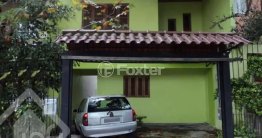 Casa com 3 quartos à venda na Rua Pedro Velho, 264, Partenon, Porto Alegre