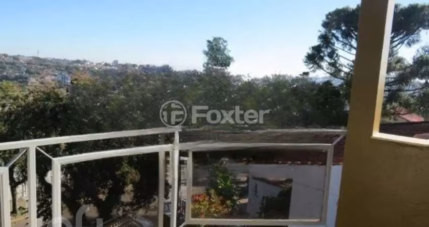 Casa com 4 quartos à venda na Rua Fernando Osório, 210, Teresópolis, Porto Alegre