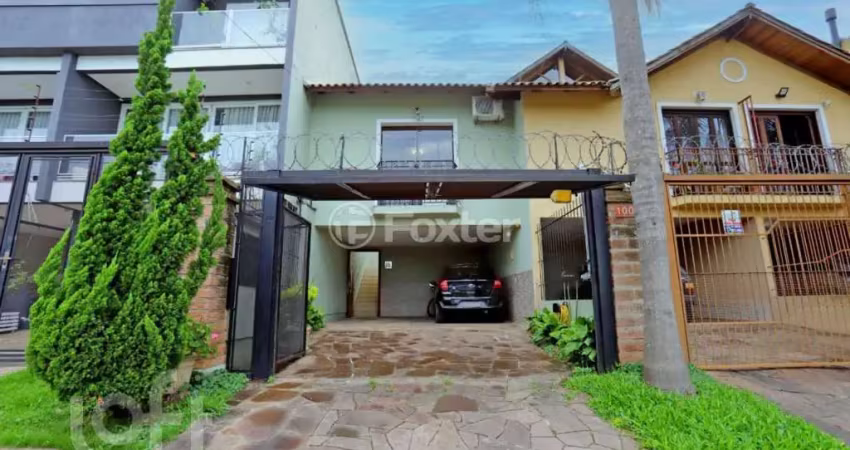 Casa com 3 quartos à venda na Rua do Pampa, 100, Costa e Silva, Porto Alegre