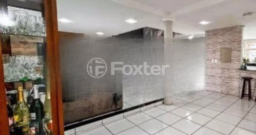 Casa com 4 quartos à venda na Rua Jerolomo Minuzo, 146, Vila Nova, Porto Alegre