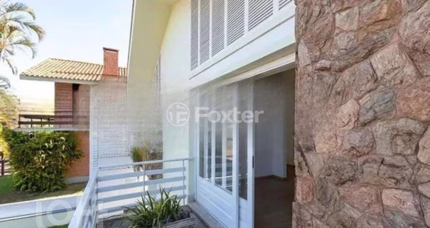 Casa com 3 quartos à venda na Rua Manauê, 76, Vila Assunção, Porto Alegre