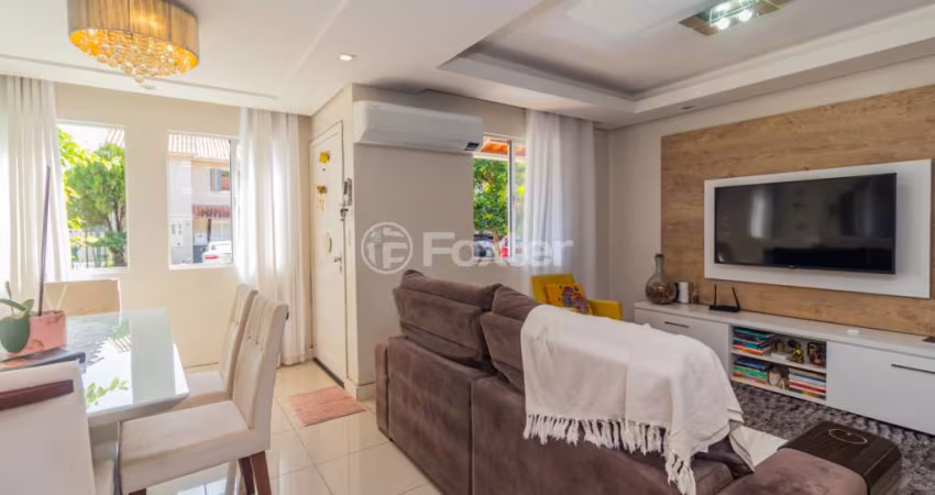 Casa em condomínio fechado com 3 quartos à venda na Avenida João Ferreira Jardim, 140, Parque Santa Fé, Porto Alegre