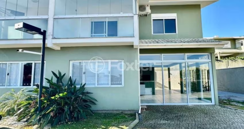 Casa em condomínio fechado com 3 quartos à venda na Rodovia Jornalista Manoel de Menezes, 2201, Barra da Lagoa, Florianópolis