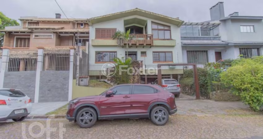 Casa com 4 quartos à venda na Rua Professor Abílio Azambuja, 136, Jardim do Salso, Porto Alegre