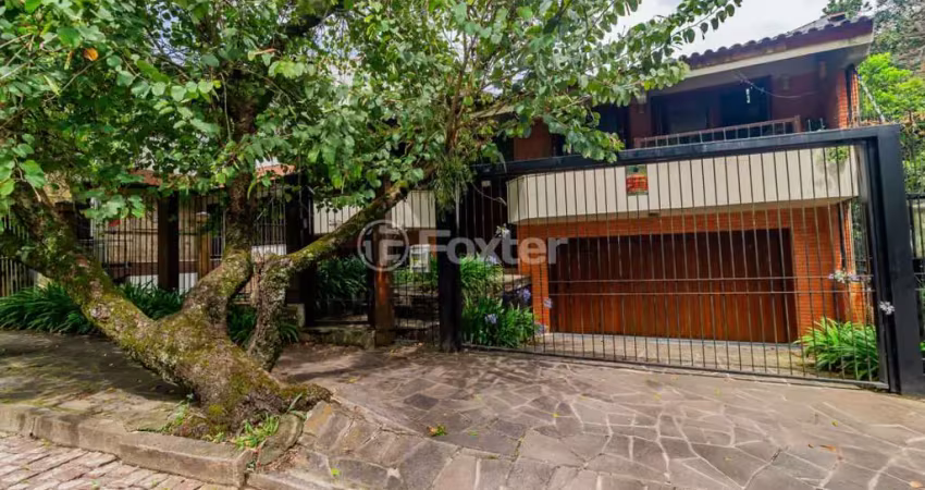 Casa com 4 quartos à venda na Rua Alcebíades Antônio dos Santos, 157, Nonoai, Porto Alegre