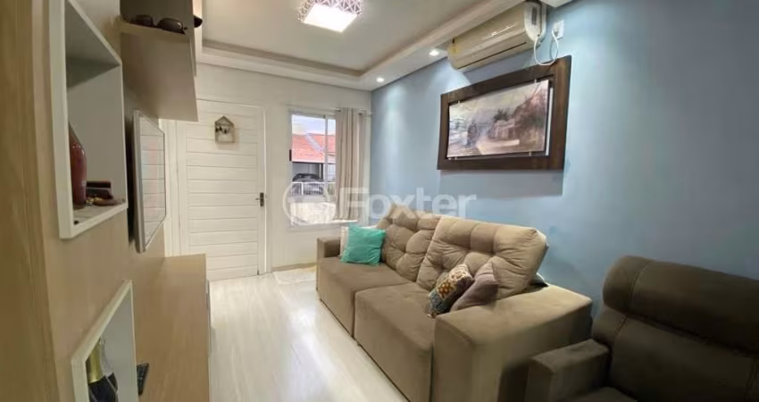 Casa em condomínio fechado com 2 quartos à venda na Rua Santa Eulália, 57, Olaria, Canoas