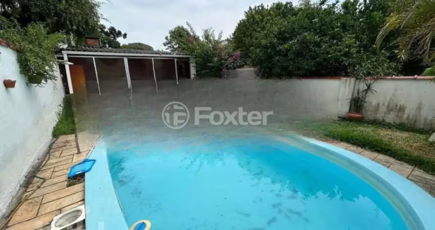 Casa com 3 quartos à venda na Rua Humberto de Campos, 237, Partenon, Porto Alegre