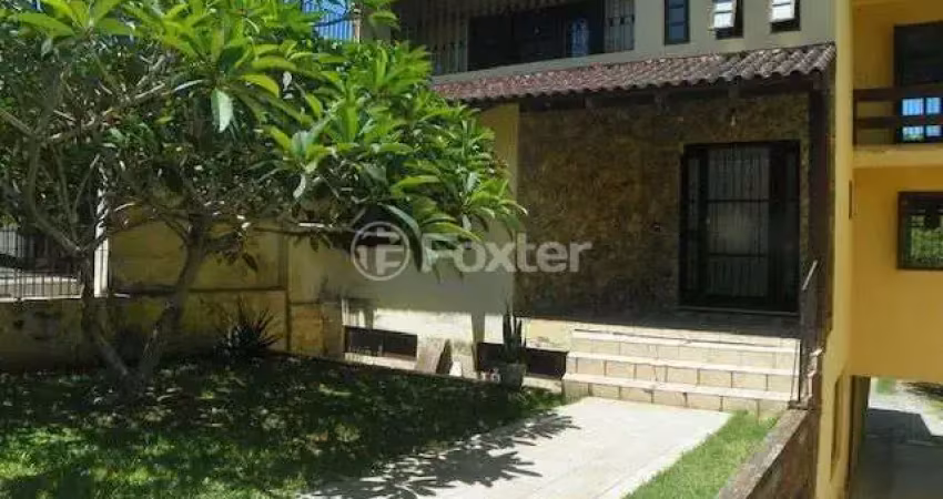 Casa com 4 quartos à venda na Rua Silvério Souto, 487, Teresópolis, Porto Alegre