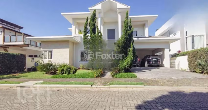 Casa em condomínio fechado com 4 quartos à venda na Rodovia Doutor Antônio Luiz Moura Gonzaga, 3825, Rio Tavares, Florianópolis