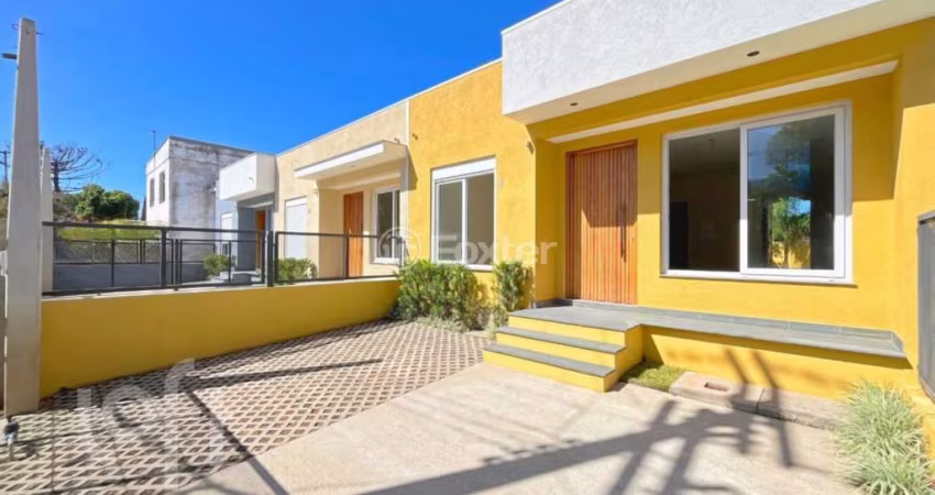 Casa com 3 quartos à venda na Rua Criciúma, 35, Guarujá, Porto Alegre