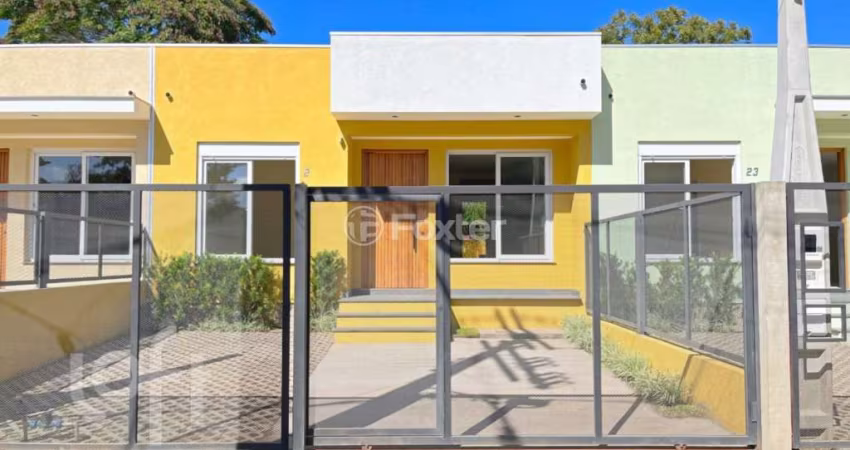Casa com 3 quartos à venda na Rua Criciúma, 23, Guarujá, Porto Alegre
