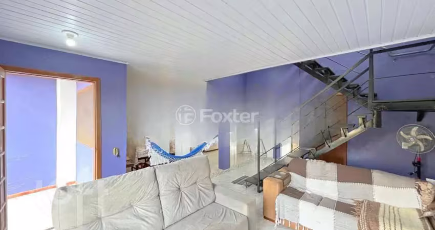 Casa em condomínio fechado com 3 quartos à venda na Avenida Vicente Monteggia, 1010, Cavalhada, Porto Alegre