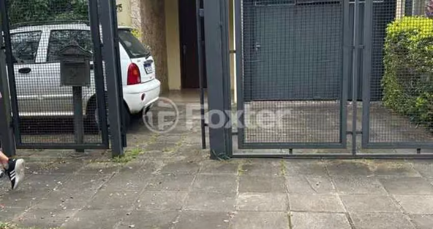 Casa com 3 quartos à venda na Travessa Antilhas, 75, Jardim Lindóia, Porto Alegre