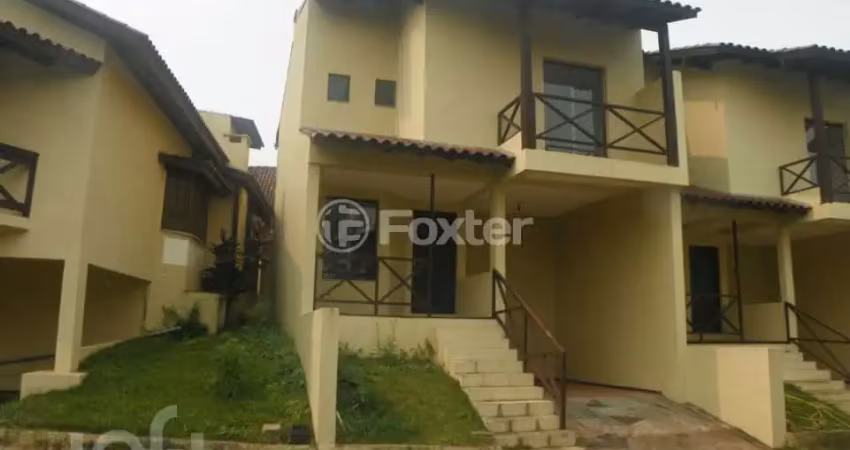 Casa em condomínio fechado com 3 quartos à venda na Avenida Vicente Monteggia, 1669, Cavalhada, Porto Alegre