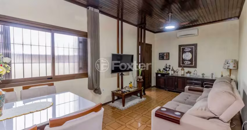 Casa com 3 quartos à venda na Rua Coelho Neto, 844, Sumaré, Alvorada
