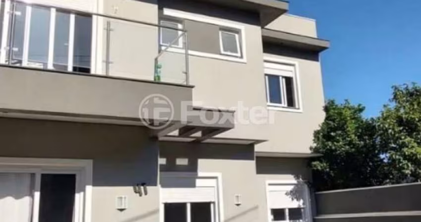 Casa com 3 quartos à venda na Rua Emília Gaúna Bochehin, 41, Parque da Matriz, Cachoeirinha