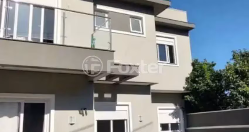 Casa com 3 quartos à venda na Rua Emília Gaúna Bochehin, 41, Parque da Matriz, Cachoeirinha