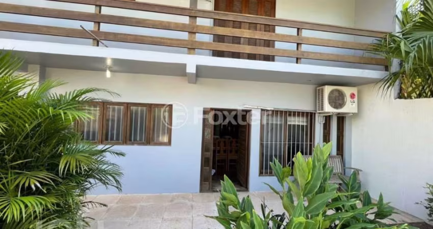 Casa com 3 quartos à venda na Rua Vítor Valpírio, 489, Anchieta, Porto Alegre