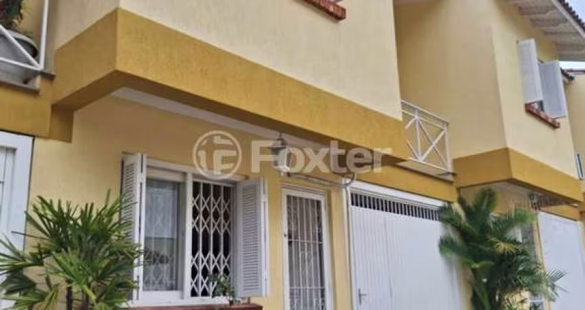 Casa em condomínio fechado com 3 quartos à venda na Rua Barbosa Neto, 205, Cavalhada, Porto Alegre