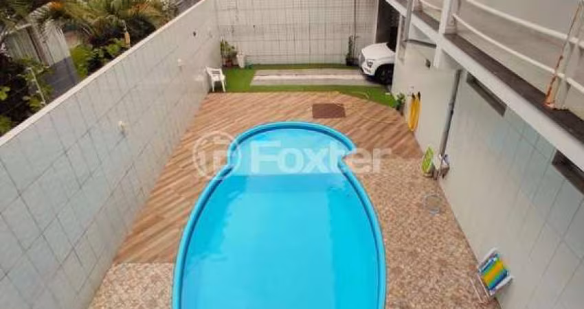 Casa com 5 quartos à venda na Rua Felipe Domingos Petry, 470, Praia Comprida, São José