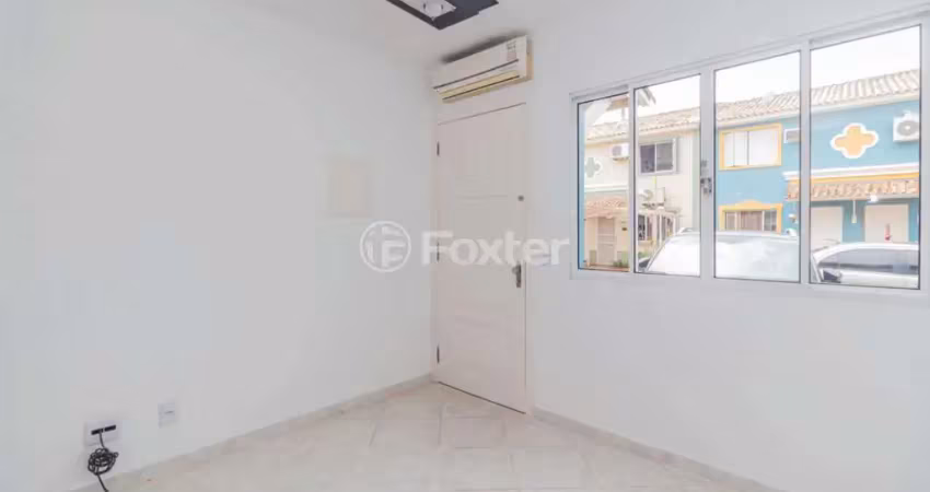 Casa em condomínio fechado com 2 quartos à venda na Avenida José Aloísio Filho, 889, Humaitá, Porto Alegre
