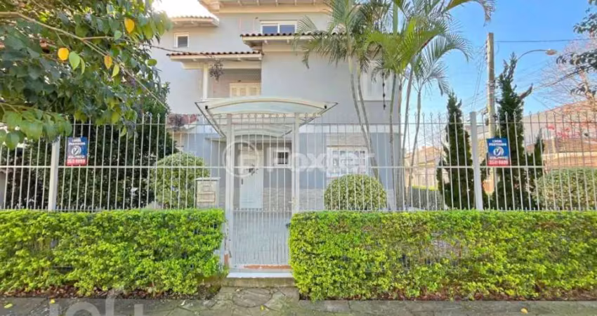 Casa com 3 quartos à venda na Rua Luiz Delfino, 99, Espírito Santo, Porto Alegre