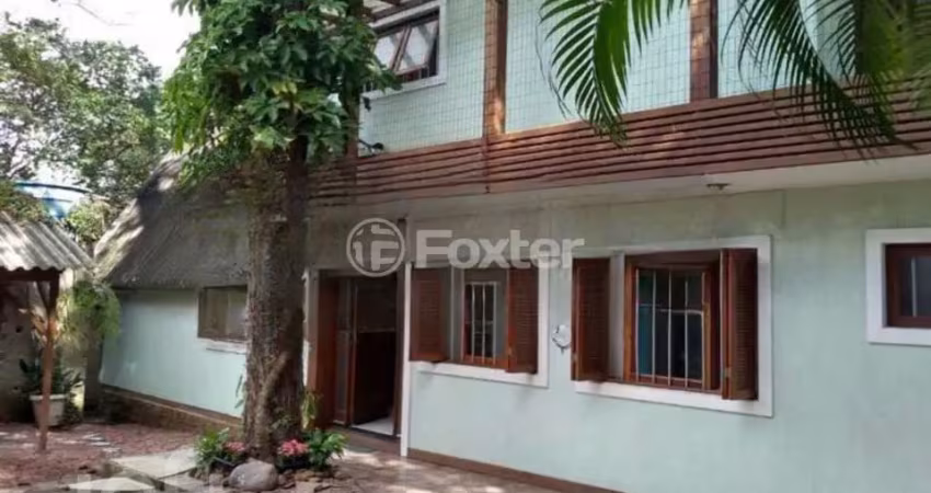 Casa com 4 quartos à venda na Rua Tejo, 70, Ipanema, Porto Alegre